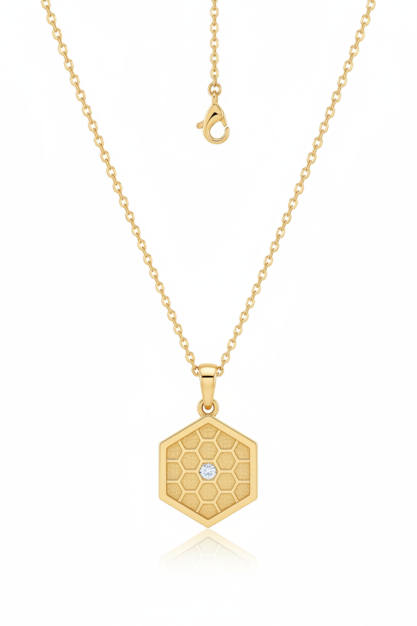 Luxury feminine gold hexagonal pendant necklace with honeycomb engraving, main product view on white background