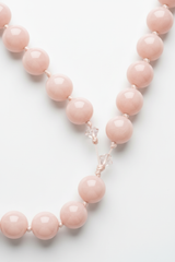 Detail shot of Le Serenity Mala soft blush gemstone beads