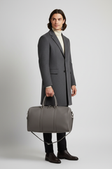 Metropolitan Travel Weekender in Gray, portrait travel lifestyle model image