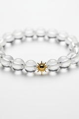 Macro close-up of clear crystal quartz beads on Pure Energy Bracelet