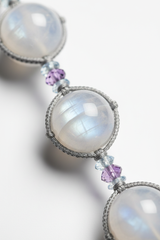 Macro detail of Le Luna Mala gemstone bead texture and cord craftsmanship