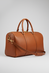 Metropolitan Travel Weekender in Brown, portrait side-angle shot with strap