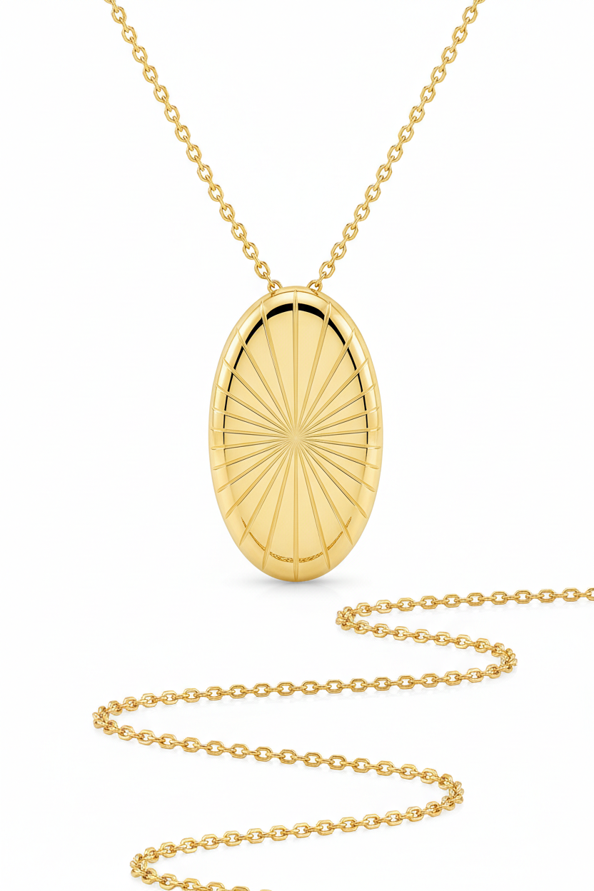 Macro jewelry image of Sacred Light Necklace showing oval gold pendant sunburst engraving and chain detail