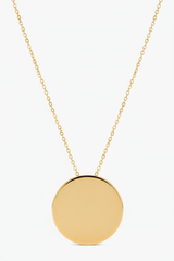 Le Harmonie luxury gold round pendant necklace centered on white background