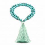 Luxury aqua blue turquoise mala necklace with mint tassel front view