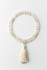 Le Divine Mala luxury soft ivory gemstone mala necklace centered on white background