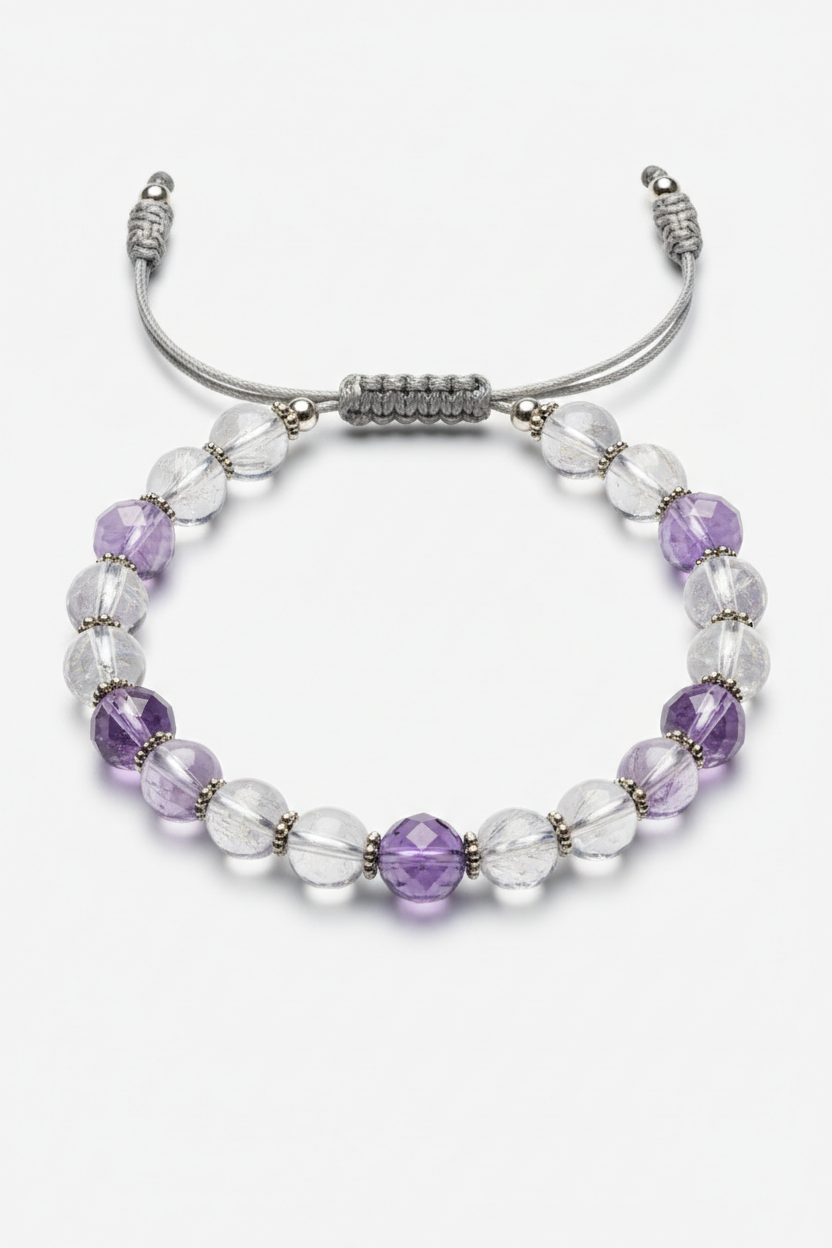 Close-up of Pure Energy Bracelet crystal bead surface with light refractions and handcrafted cord craftsmanship