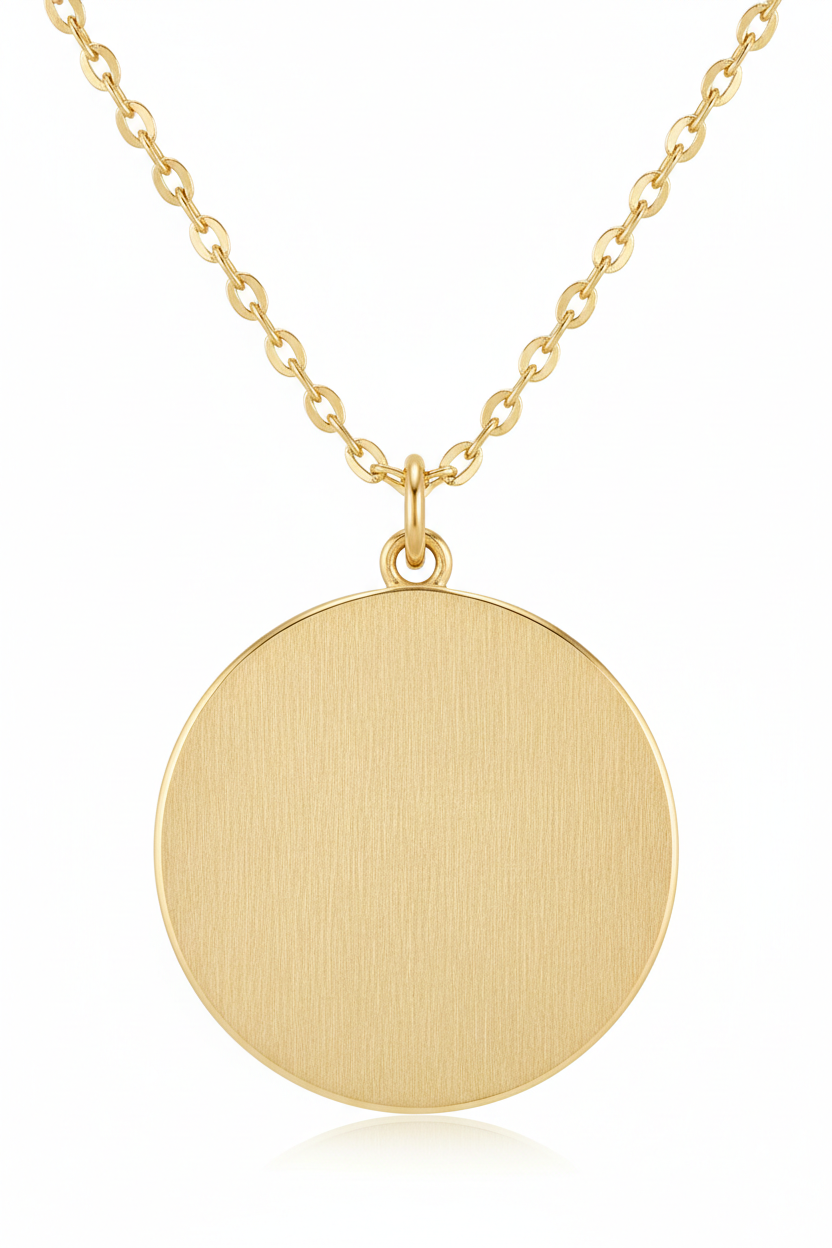 Jewelry macro close-up of Golden Aura Necklace showing hammered gold disc texture and chain detail