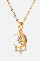 Macro detail of Le Mirage gold texture and celestial pendant craftsmanship