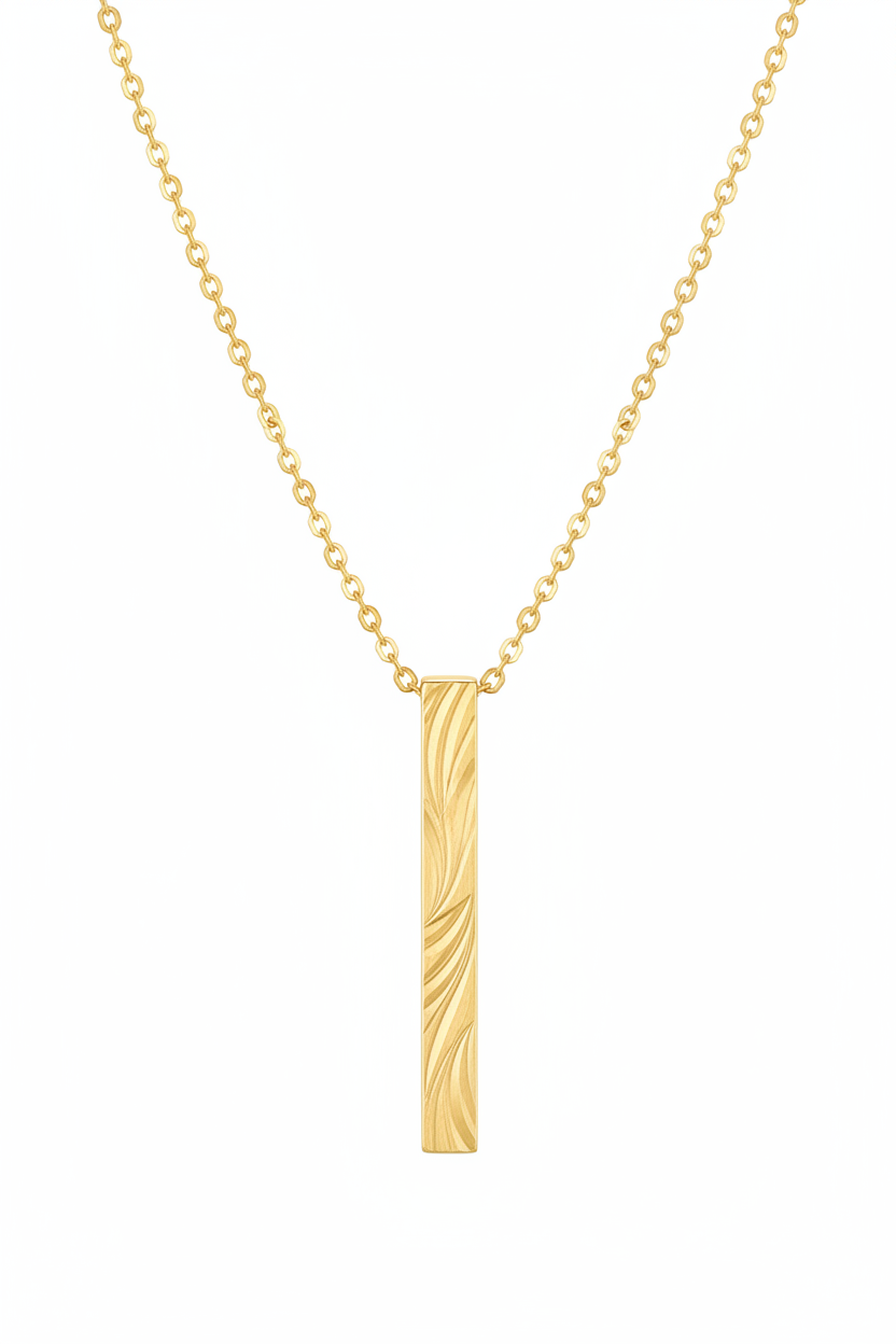 Luxury gold rectangular pendant necklace with engraved texture and fine chain, centered on white background