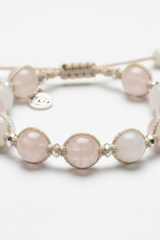 Macro texture shot of Calm Soul Bracelet premium bead surface and handcrafted cord craftsmanship
