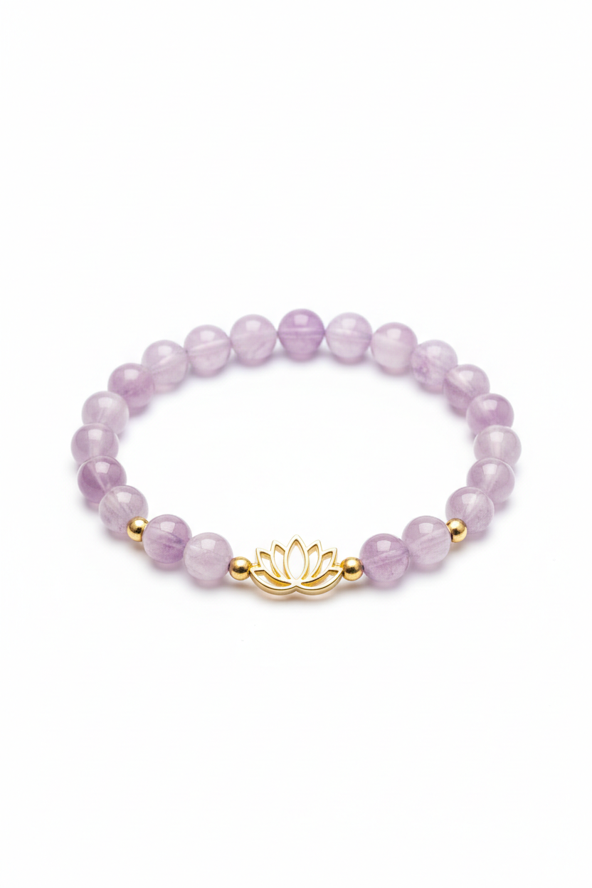 Luxury spiritual bracelet with lavender amethyst beads and gold lotus charm on white background