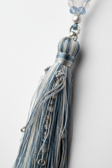 Close-up of Le Luna Mala elegant silk tassel in moonstone tones