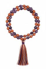Le Omnia Mala luxury hand-knotted gemstone mala necklace centered on white background