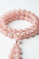 Soft blush pink gemstone bead detail of Le Amara Mala necklace