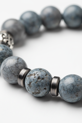 Close-up of natural gemstone beads on Zen Stone Bracelet in grey and slate tones