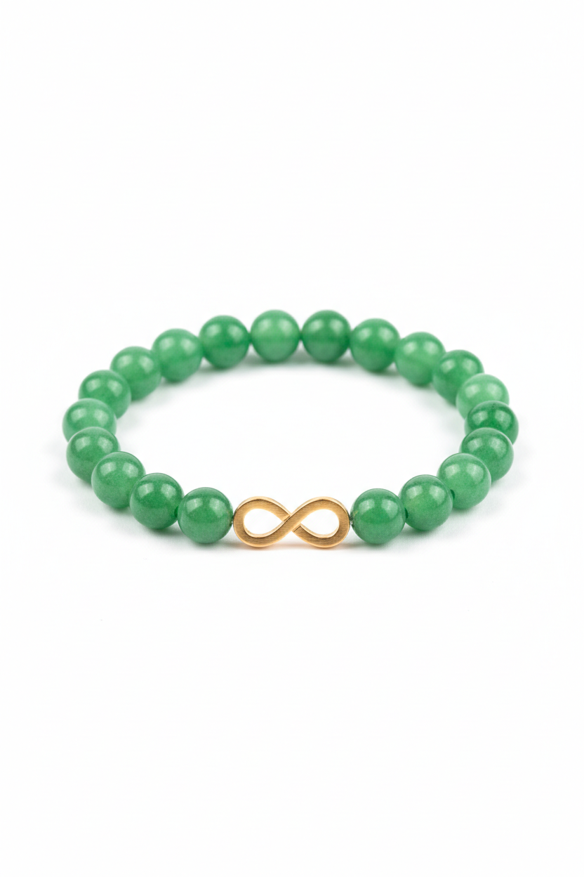 Luxury jade green gemstone bracelet with gold infinity charm, front view on white background