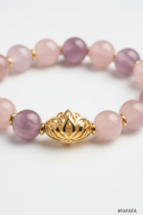 Premium elegant gold charm detail on Harmony Stone Bracelet against rose and mauve gemstone beads