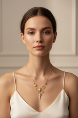 Elegant female model wearing Le Stella gold star pendant necklace