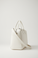 Executive Carry Weekender in White Refined Smooth Leather – side angle with strap