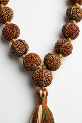 Close-up of Zen Mala Necklace natural bead surface and handcrafted cord craftsmanship