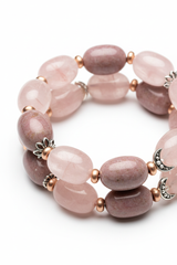 Close-up of premium natural gemstone beads on Harmony Stone Bracelet in soft rose and mauve tones