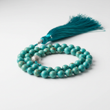 Elegant turquoise mala necklace side angle view