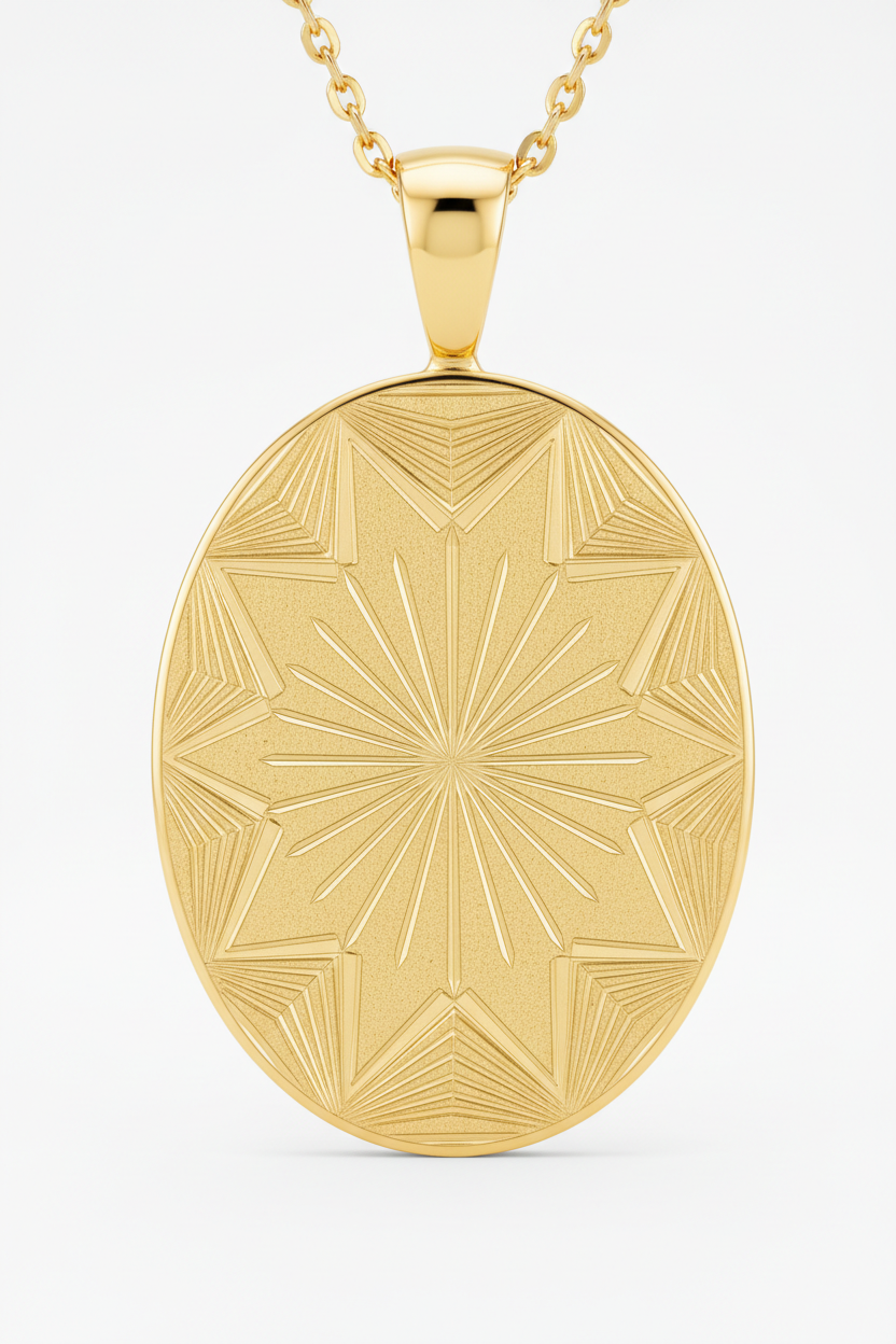 Close-up pendant detail of oval gold pendant with geometric sunburst engraving on Sacred Light Necklace