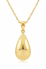 Jewelry close-up of Divine Energy Necklace showing gold teardrop pendant and chain detail