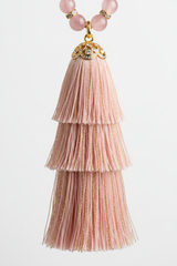 Close-up of Le Serenity Mala elegant silk tassel detailing